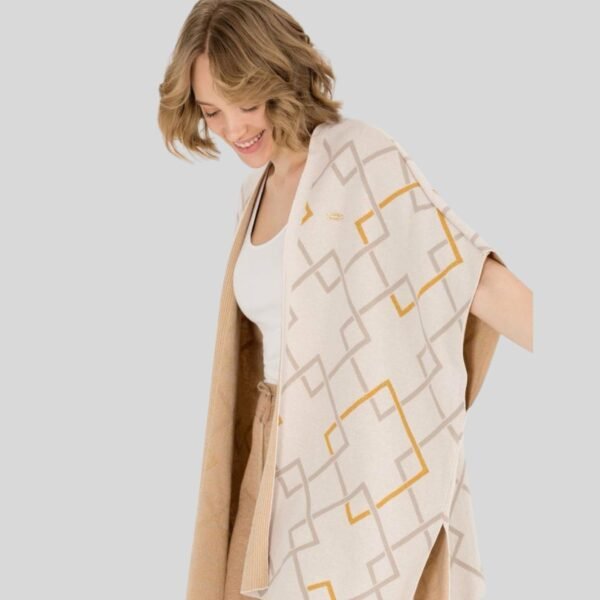 Woman’s Cream Poncho