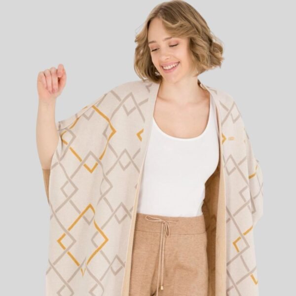 Woman’s Cream Poncho